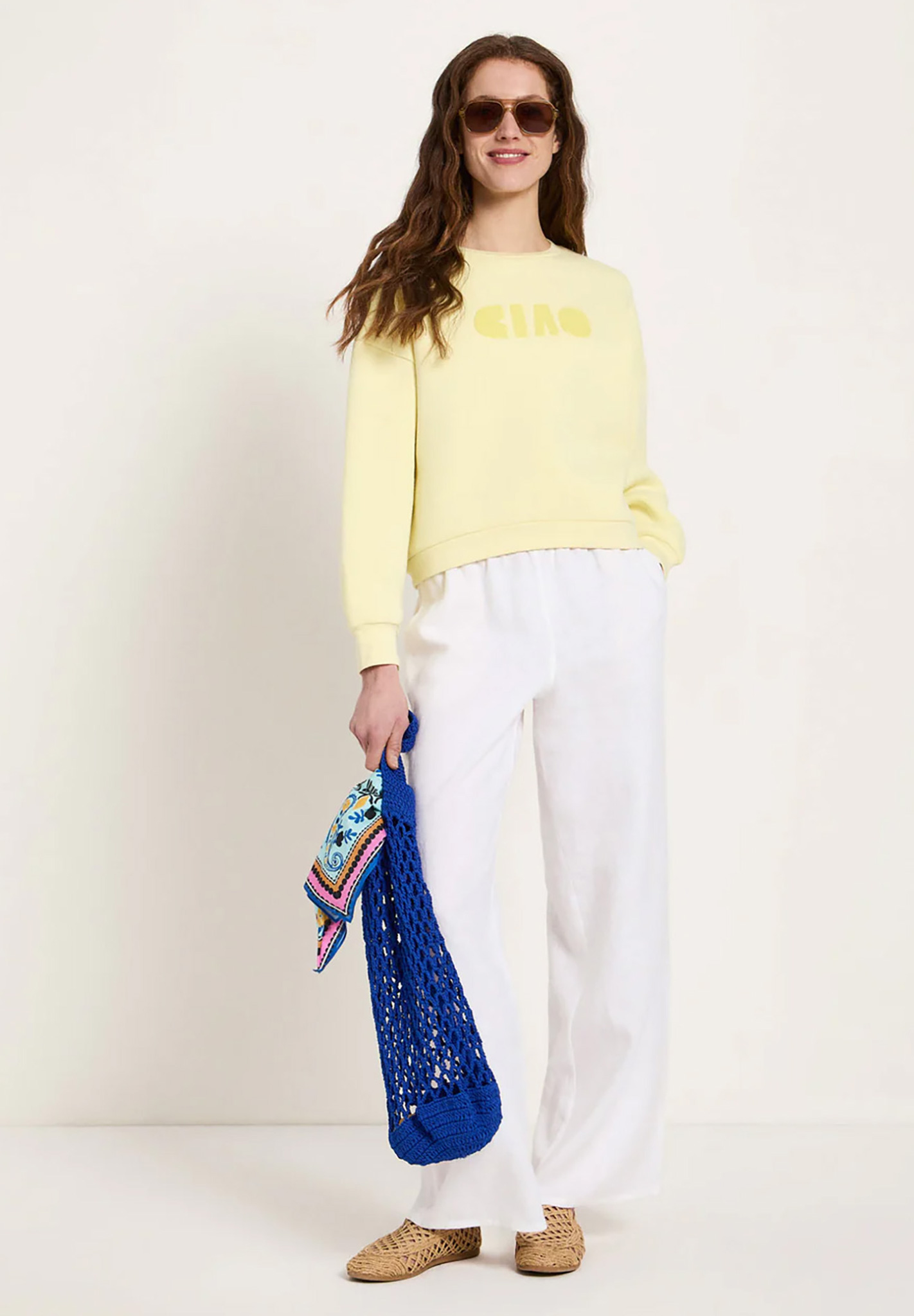 Sweatshirt, Crew neck, Pastel yellow, White wide-leg pants, Knitted tote bag